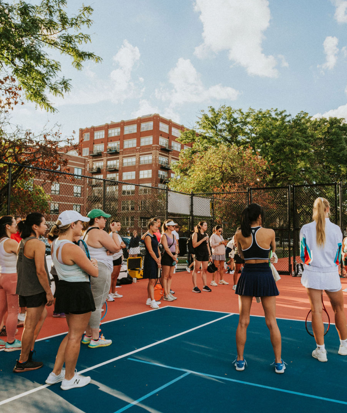 Tennis player meetup on tennis court